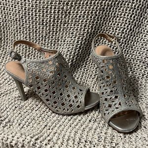 Micheal Shannon Sparkly silver bootie stilettos.